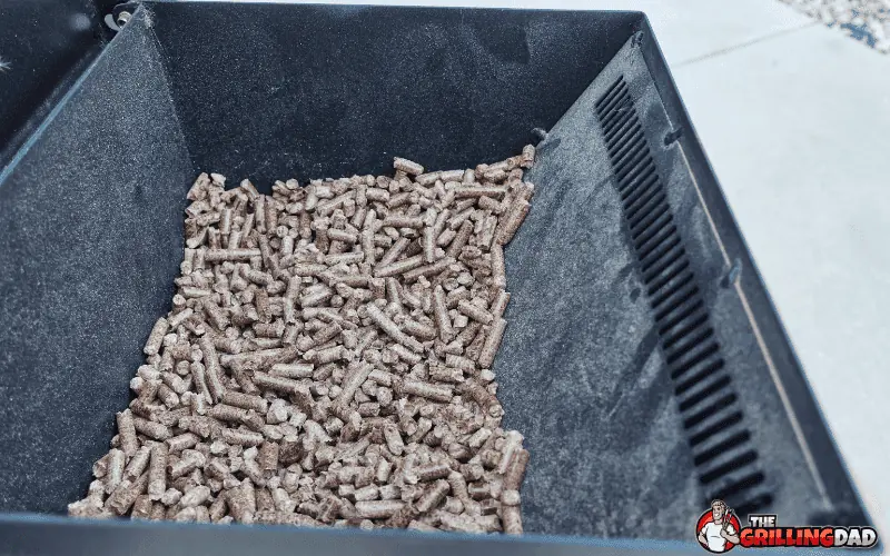 wood pellets in a pellet smoker hopper