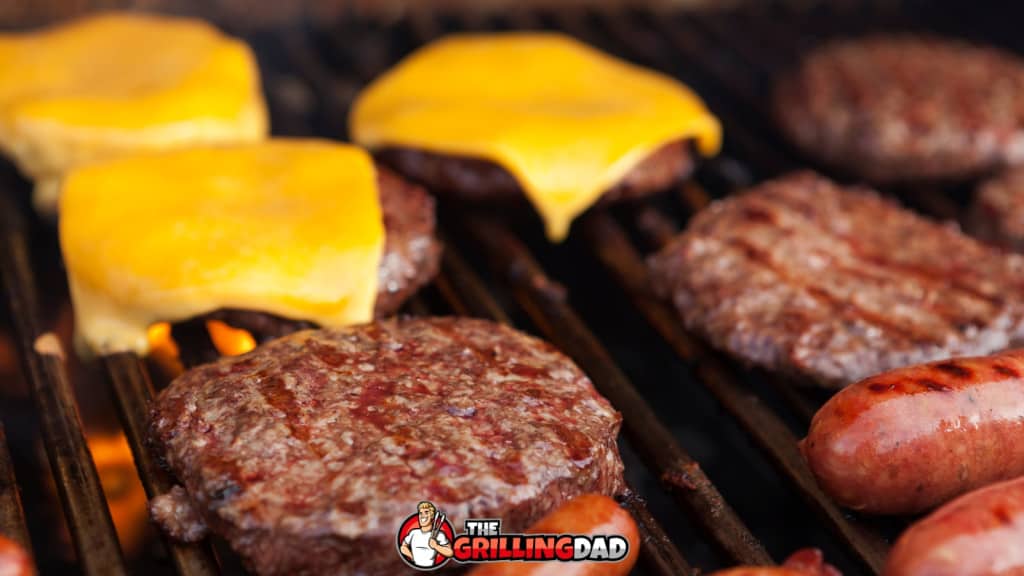 hamburgers and hot dogs on the grill