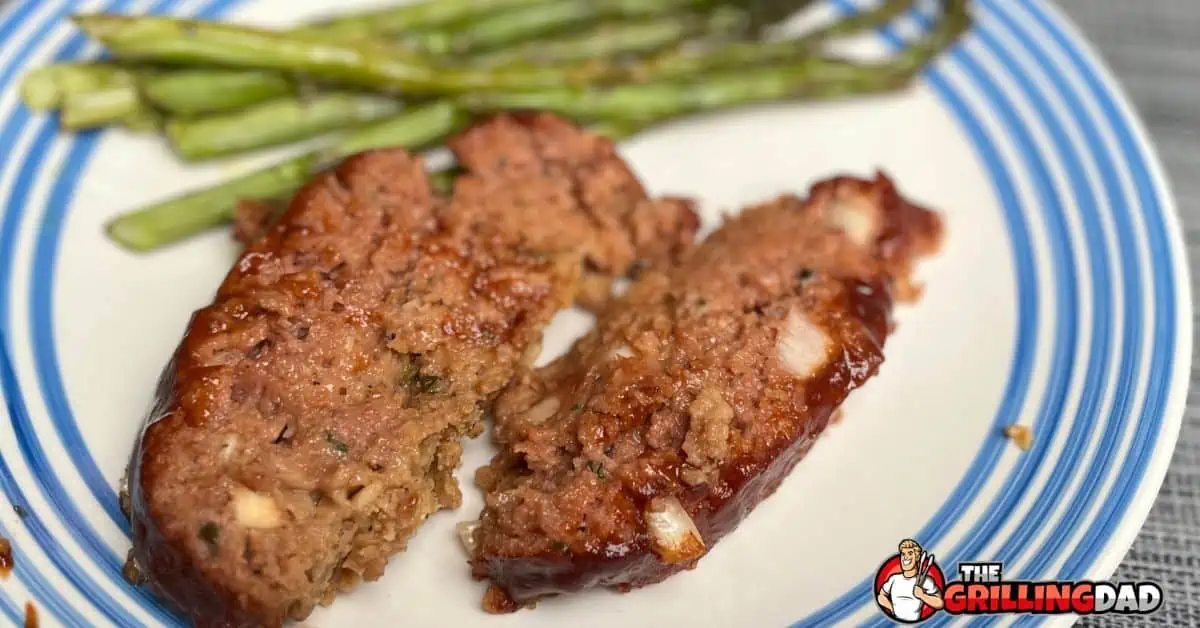 smoked meatloaf and asparagus on a plate