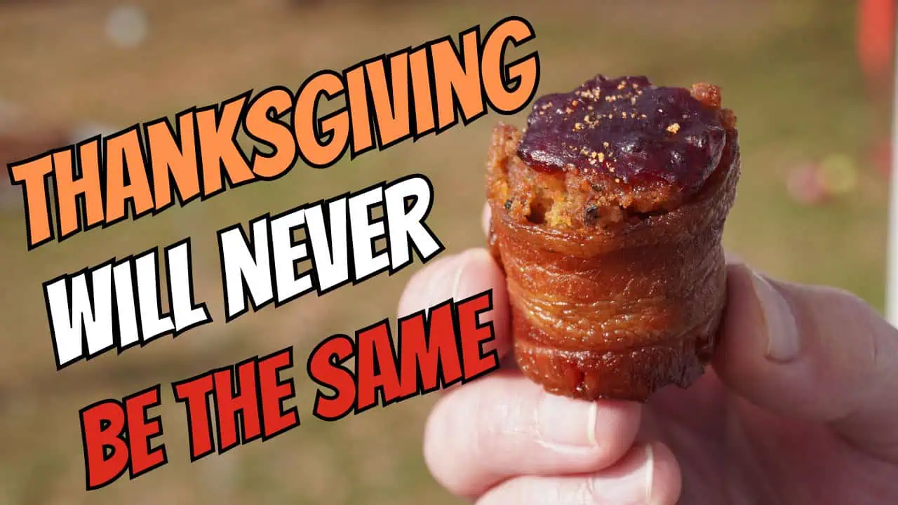 Turkey shot consisting of a turkey kielbasa wrapped in bacon, filled with stuffing and topped with cranberry sauce.